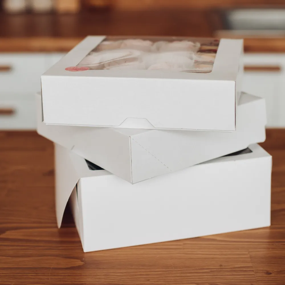 clear empty cake and pastry boxes with logo