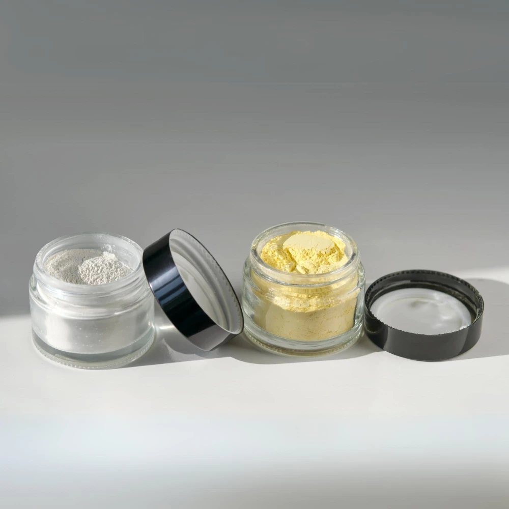 small plastic jars with lids